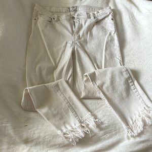 Free people off white jeans with fringe on the bottom size 18